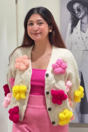 🧶 "Enchanting Whimsical Yarn Blossom Wonderland Hand-Knit Cream Cardigan Bursting with Plush Pink, Red, and Yellow Flowers for Joyful Fashionistas" 🧶​