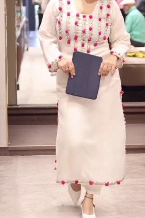 Hand-Embellished Kurta Set with Pink Tassel Detailing – Where Elegance Meets Artistry