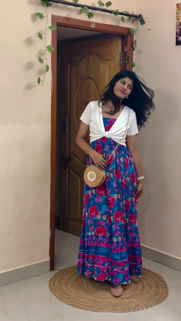Effortlessly Stylish Summer Look with This Floral Maxi Dress and Chic Layered White Shrug Combo - Image 4