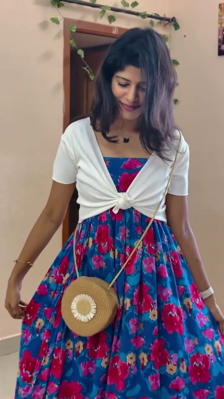 Effortlessly Stylish Summer Look with This Floral Maxi Dress and Chic Layered White Shrug Combo - Image 2