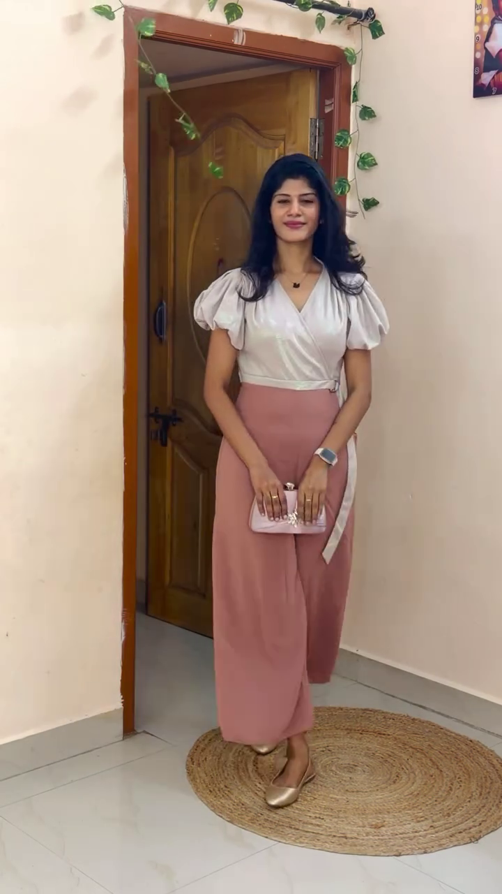 Elevate Your Evening Style with This Chic Satin Top and Blush Pink Trouser Combo for a Sophisticated Modern Look